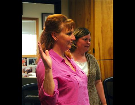 Lisa Koetter and Wendy Forgey were sworn in last week as new Arlee School board members during the general meeting.