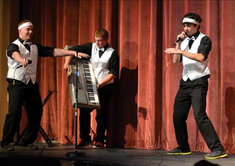 Tyler Anderson, Bryce Cullen and Micah McClure perform a humorous interpretive rap.