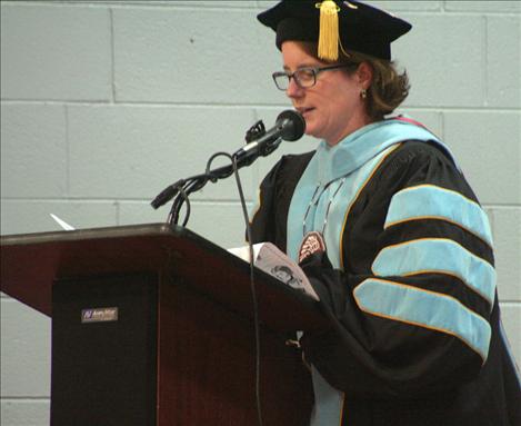 Teacher Anna Baldwin gives the commencement address at Arlee's graduation.