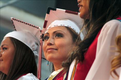 Salutatorian Nichole Rang stands with her class of 2014.