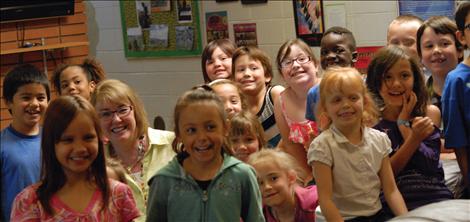 Cherry Valley Elementary School Principal Elaine Meeks and a group of her announcers have fun. 