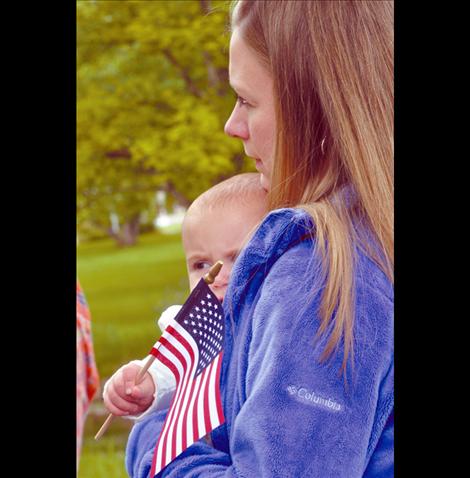 Erika Mitchell and her daughter, Abrianna, attend the Memorial Day parade in Ronan.