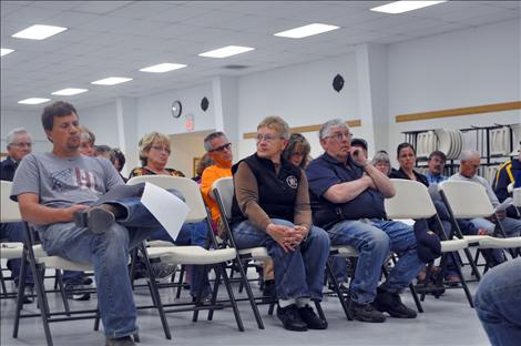 Community member listen to proposed ideas for the expansion of Highway 93.