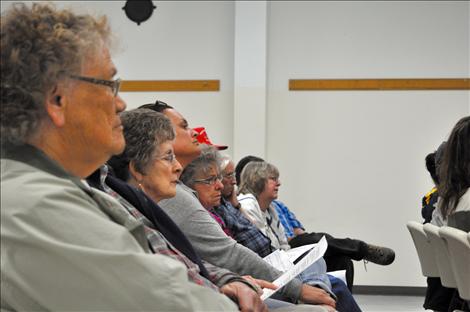 Community member listen to proposed ideas for the expansion of Highway 93.