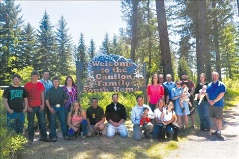 The Cantlon Family Youth Home receives a new sign made by vocational-ag students at Ronan High School. 