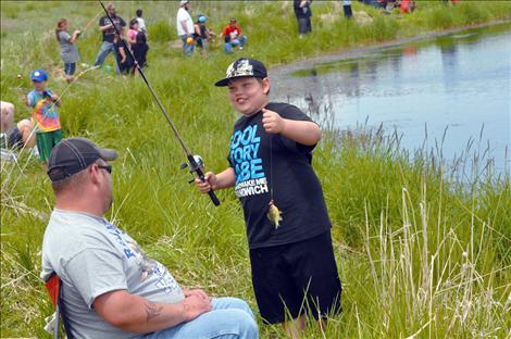 Montana McElderry hooks a sunfish. 