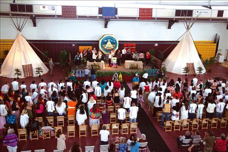 Salish Kootenai College graduates and family fill the gymnasium.