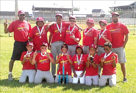 The undefeated Polson Cardinals team includes, front row from left, Jarius Smith, Hunter Pittsley, Nate Plant, Zach Plant, Denzel Lefthand and Eli VanMeter. Back row, from left, are coach Scott Renault, Wailand Gravelle, Anthony Jones, Josh Young, Joseph Renault, Dugan Davis and Coach Pete.