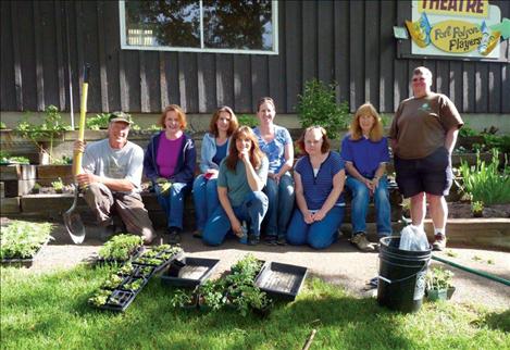 Participants in the Lake County Master Gardeners program, from left, include Jon Gravning, Jeanne Quigley, Emilianne Landsdown, Lorri Lenz, LaDana Hintz, Jean Gravining and MonaRae Tuhy. Not pictured are Kim and Sandy Norman, who water the flower display throughout the summer along with Kellen and Kaycee Wright.