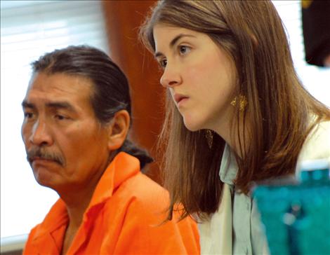 Harry Lozeau, left, appears in District Judge Deborah Kim Christopher’s court on June 12, with public defender Ashley Morigeau. Later, Morigeau told Judge Christopher there is a conflict of interest regarding Lozeau’s representation by the public defender’s office. He currently has no attorney of record. According to court officials, the OPD will likely hire an attorney from outside their office to represent Lozeau.