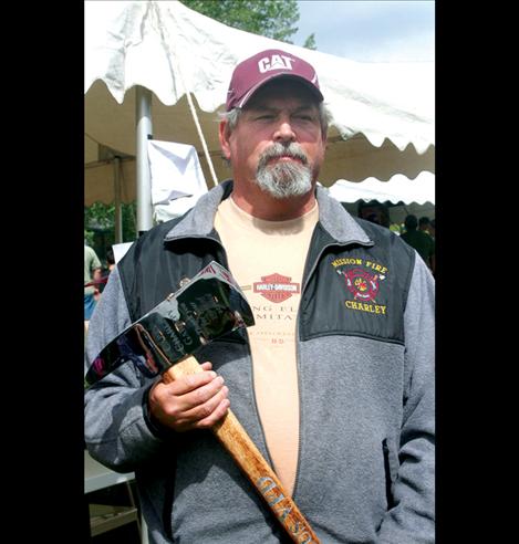 Charley Gariepy received a golden axe for 32 years of service with the St. Ignatius Volunteer Fire Department.