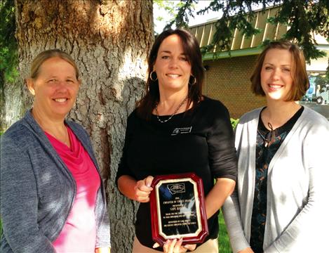 Lake County Job Service Manager Debbie Krantz, left, and Job Service Employer Committee Chair Whitney Cantlon, right, present an Employer of Choice Award to Deanne Richardson of SAFE Harbor.