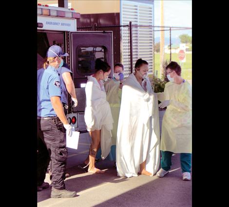 Kicking Horse Job Corps volunteers acted as victims of a Malathion exposure during the June 25 drill.