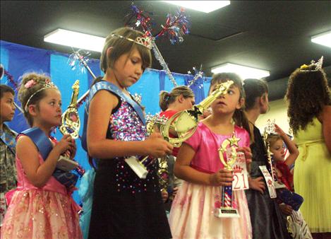 Other Little Miss and Mr. Good Old Days contenders show off their crowns and trophies.