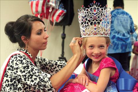 Little Miss Good Old Days Lola Schock, 7, needs help from mom, Mrs. Montana 2013 Alyssa Schock.