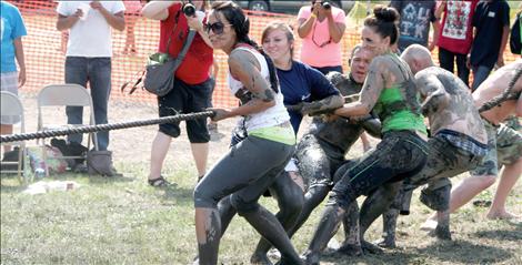 A day after the crowning, the former Mrs. Montana and Mrs. Hawaii participated in a muddy tug-of-war during Good Old Days in St. Ignatius.