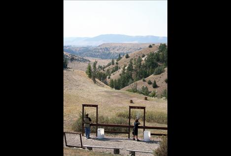 Two 4-H members compete in the 5-stand event at the state 4-H qualifier held recently at Big Sky Sporting Clays near Polson