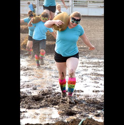 Sporting matching socks, shirts and sunglasses, team Vet Care Montana races through the course.