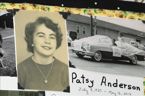 Smiling from her senior picture and riding atop a convertible as homecoming queen, Pat Anderson enjoys life.