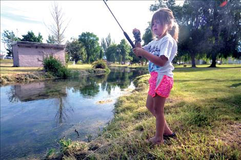 Sheadon Kain fishes along Spring Creek in Ronan.