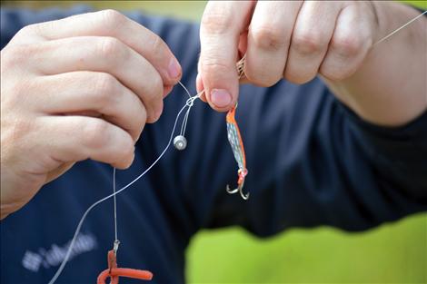 Dan Webber of Sherwood, Oreg., helped untangle two boys’ lines.