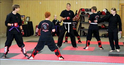 Sensei Erika Haydon, far right, teaches a class at Odori Kumo Combat Martial Arts School in Ronan.