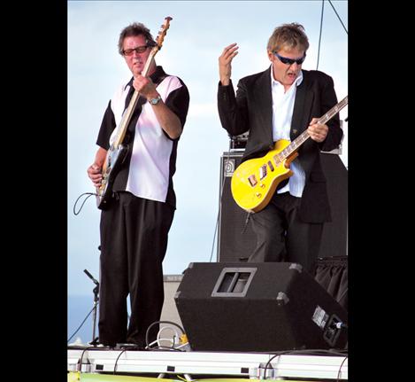 Bob Ehrgott and Bobby Patterson of “The Fat Tones,” play to the crowd in the early evening on Saturday  