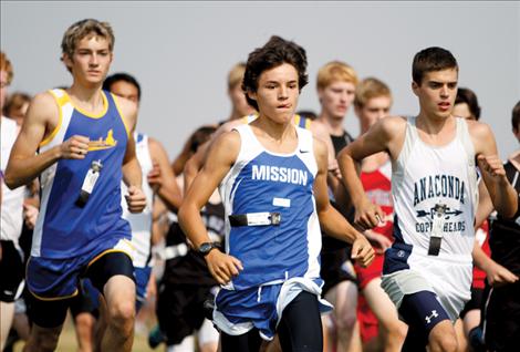 Mission senior Paden Alexander leads at the start of the Ronan Invitational cross-country meet Sept. 15. Alexander took third in the race and posted his best time yet of 15:19.