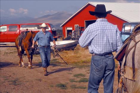 Longtime horse trainer Ken Noland, left, chose Dusty Morigeau to train his  horses throughout the summer.