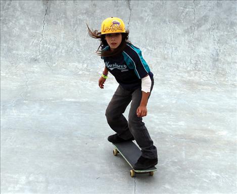 Cailan Burke glides over the concrete.  