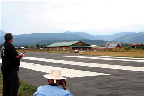 Jim Wilson lands his plane on the St. Ignatius Airport runway.
