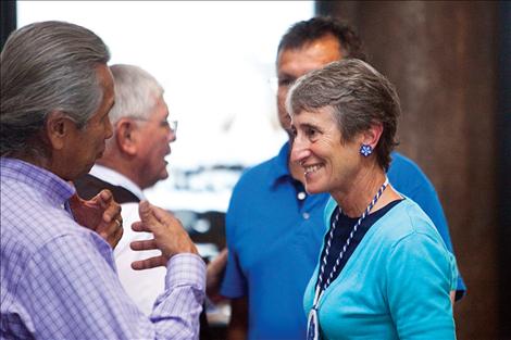 Confederated Salish and Kootenai Tribal Councilman Vernon Finley chats with Secretary of the Interior Sally Jewel before a press  conference announcing the rollout of a land buyback program. 