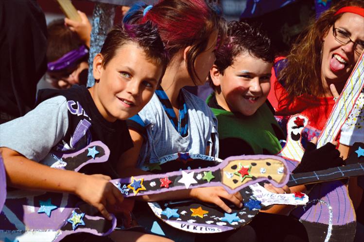 Charlo students on their homecoming parade float send a message to the Friday’s football opponent Victor Pirates — “Punk the Planks.” 