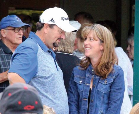 Carrie Pichler/Valley Journal Roger Wallace, golf pro at Polson Bay Golf Course, stands with wife Carolyn as he is honored Sept. 2 by other golfers and friends. Wallace earned the prestigious PGA Bill Strausbaugh Award.