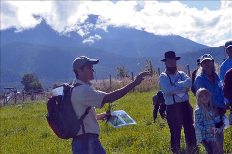 Ranchers listen to Conservationist Ben Montgomery explain non-traditional grazing concepts.