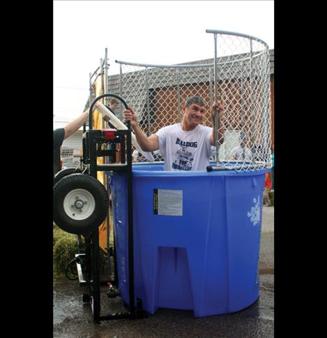 Middle School Principal Dan Durglo gets dunked.