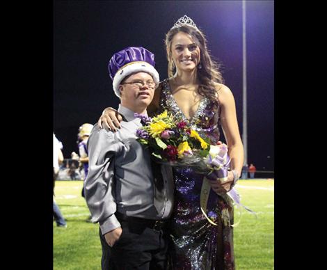 Polson Homecoming King Robbie Hayes and Queen Jaiden Toth are crowned during Friday night’s football game.