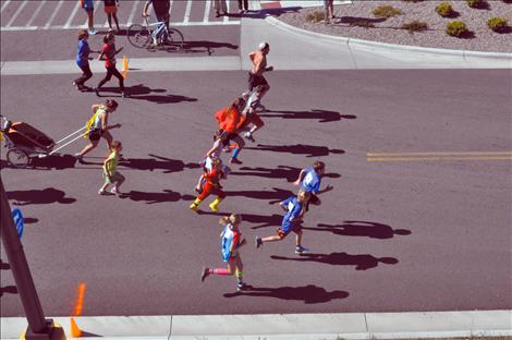Superheros take off from the starting line. 