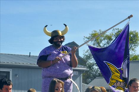Jessica Dennison shows off her school spirit in the Charlo Homecoming parade.  