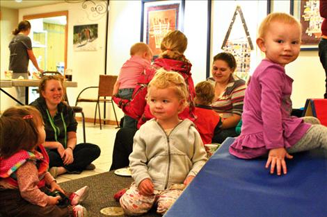 Parents and children getting some needed social time during the playgroup.