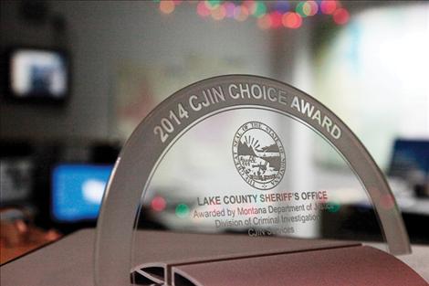 An award won by dispatcher Staycha Hansen stands in a place of honor in the Lake County  dispatch center. 