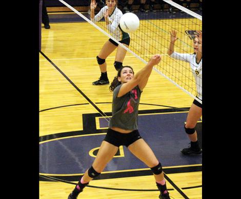 Lady Pirate senior Jaiden Toth pops up after dig, keeping the Lady Pirates alive in a game against Whitefish.