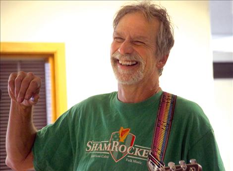 Neal Lewing laughs at a quip from one of the ShamRockers during a recording session.