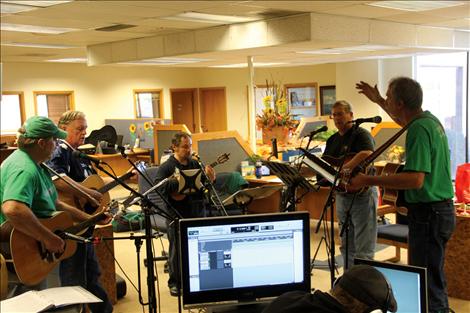 The ShamRockers — from left John Glueckert, Rick Skates, Mike Lozar, Rob Sloan and Neal Lewing — record songs for their third CD, due out in December.