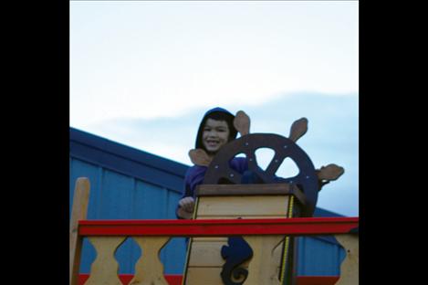 Berl Tiskus/Valley Journal A smiling Don McFarland stands at the helm of the Blackhawk for its first  “voyage” at his house. 