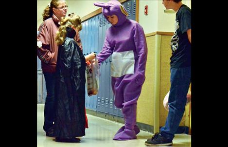 Verla Costilla, 15, handed out candy in a Teletubby costume. 