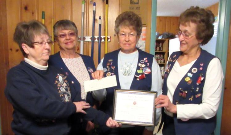 Each year the Ronan Ladies Auxiliary VFW 5652 honors a group or someone who makes a difference in our community. This year, we honored the Bread Basket for our “Make a Difference Day.” On Tuesday, Oct. 28, auxiliary members presented to Gloria Kramer, vice president of the Ronan Bread Basket, a certificate of appreciation for serving our community in need and a check for $100. Pictured from left are Gloria Kramer, Helen Sorenson, Peggy Cote-Smith and Margaret Fay.