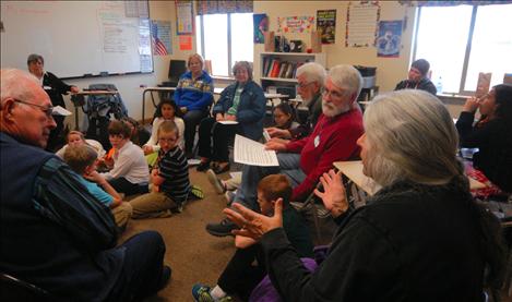 vGrandparents and grandchildren in Mallory Witham’s 5th and 6th grade classroom talk about school and the differences of their experiences.