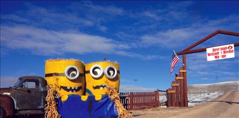 Two minions greet drivers on Eli Gap Road as they greeted Brennan Andrews when he arrived home from basic training at Camp Pendleton.  