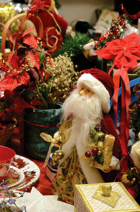 The Folkshop offers a selection of gently-used holiday items at the St. Ignatius thrift store, including a figurine Santa Claus, holiday table decorations, tableware, and more. 